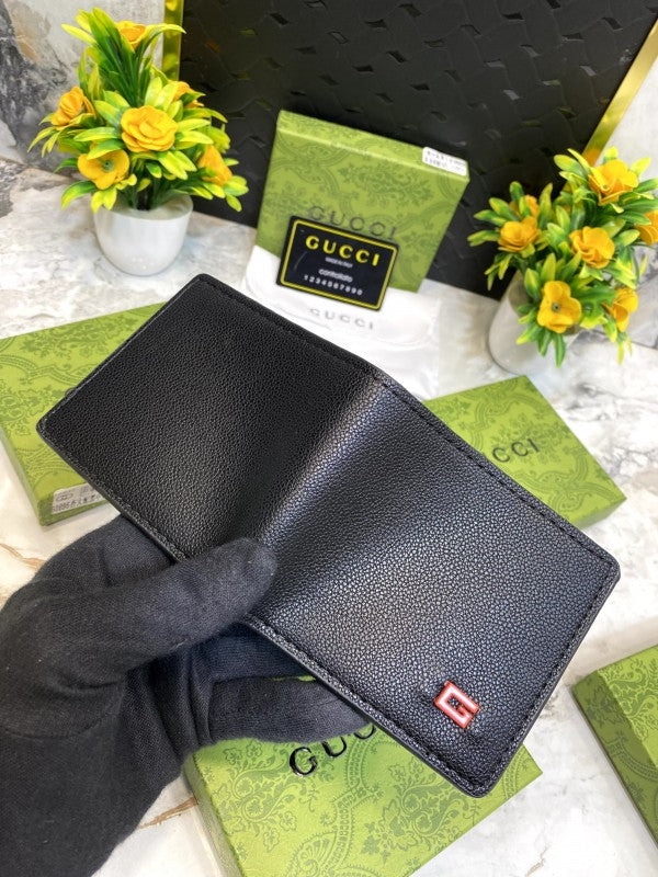 Gucci Black Pebbled Leather Bifold Wallet with Red ‘G’ Logo Accent