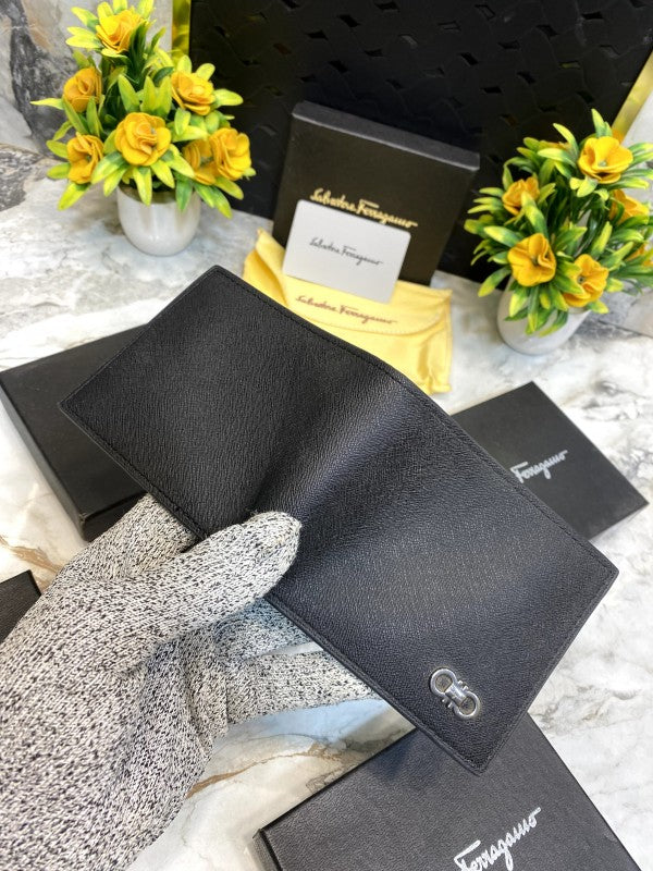 Salvatore Ferragamo Black Textured Leather Bifold Wallet with Gancini Logo